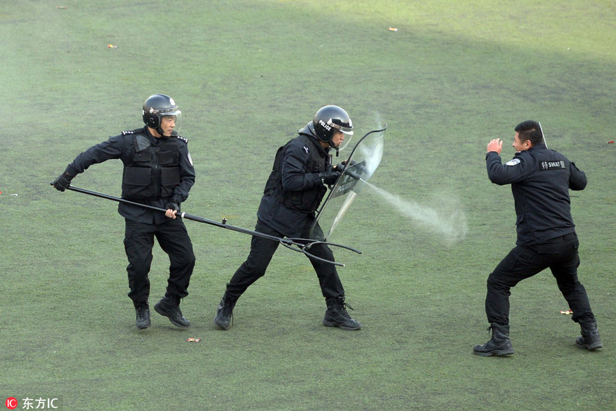 Aim, shoot, rescue: SWAT teams train in Beijing