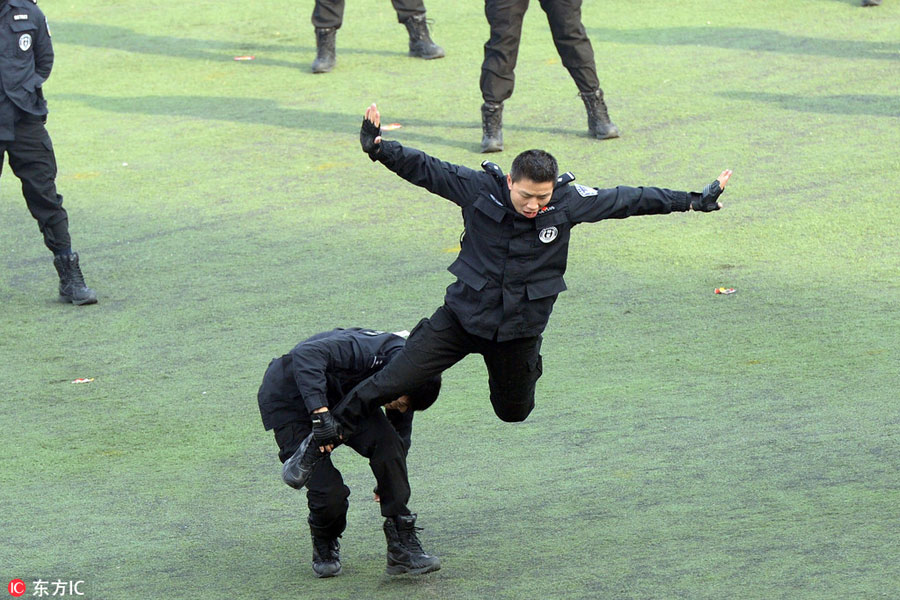 Aim, shoot, rescue: SWAT teams train in Beijing