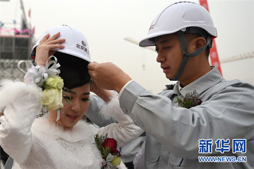 Group wedding held on construction site of Beijing new airport