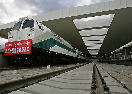 The first train from Lhasa Railway Station in Tibet waits to leave the platform heading for Lanzhou in Gansu province July 1, 2006. 