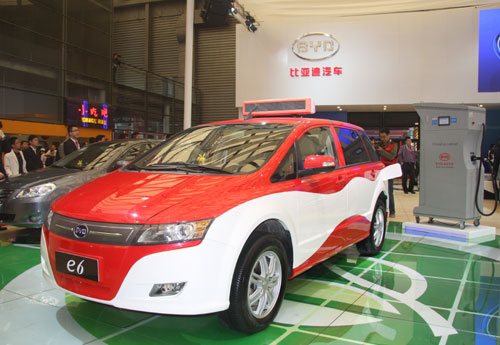 Green cars at the auto show