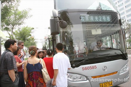 Beijing to keep low fares on bus, subway