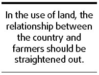 Reform land system to protect farmers' rights