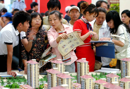 China cuts taxes, rates to boost housing market