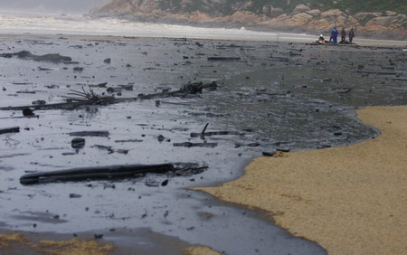 Oil companies cough up for spills