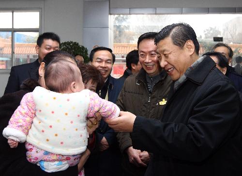 Xi urges change in development mode