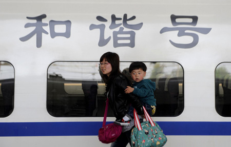 China cuts train speeds, ticket prices