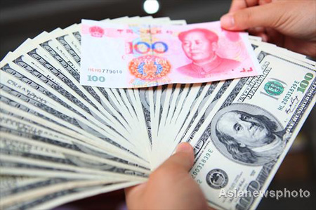 Yuan rises to record high against US dollar