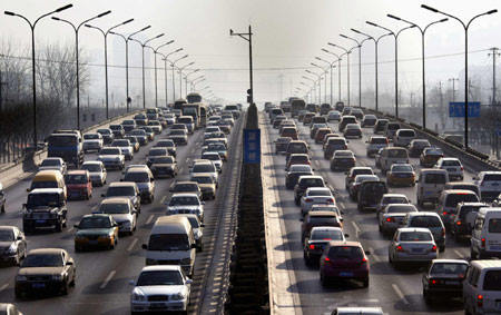 China 2011 car sales rise at slowest annual pace