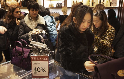 Chinese set record for overseas buying