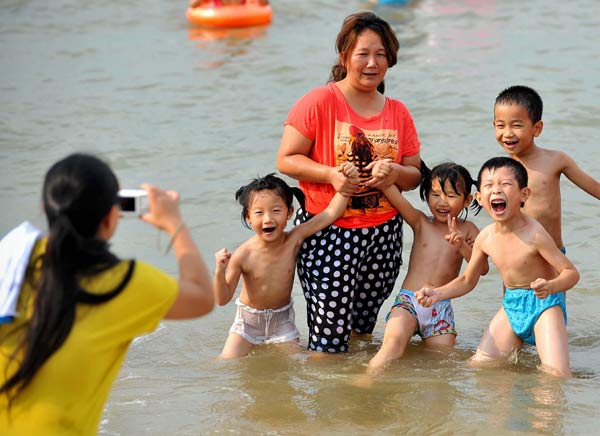 Hainan to host 2014 global tourism summit