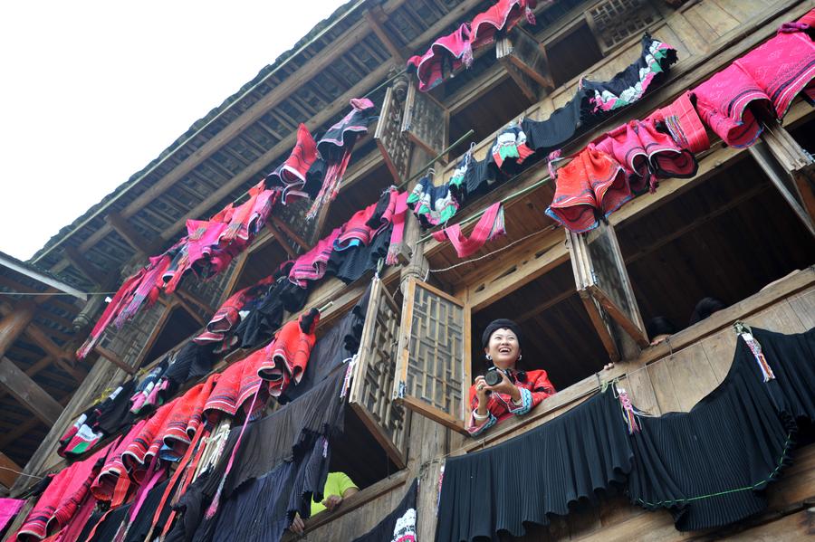 Weaving profits, tradition with hand-made dresses