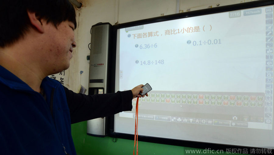 School children use responder device in class