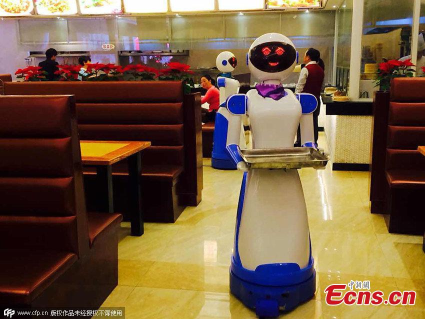 Robot waiters serve in Ningbo restaurant