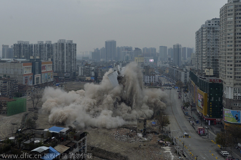 Wuhan brings down building with controlled blasting