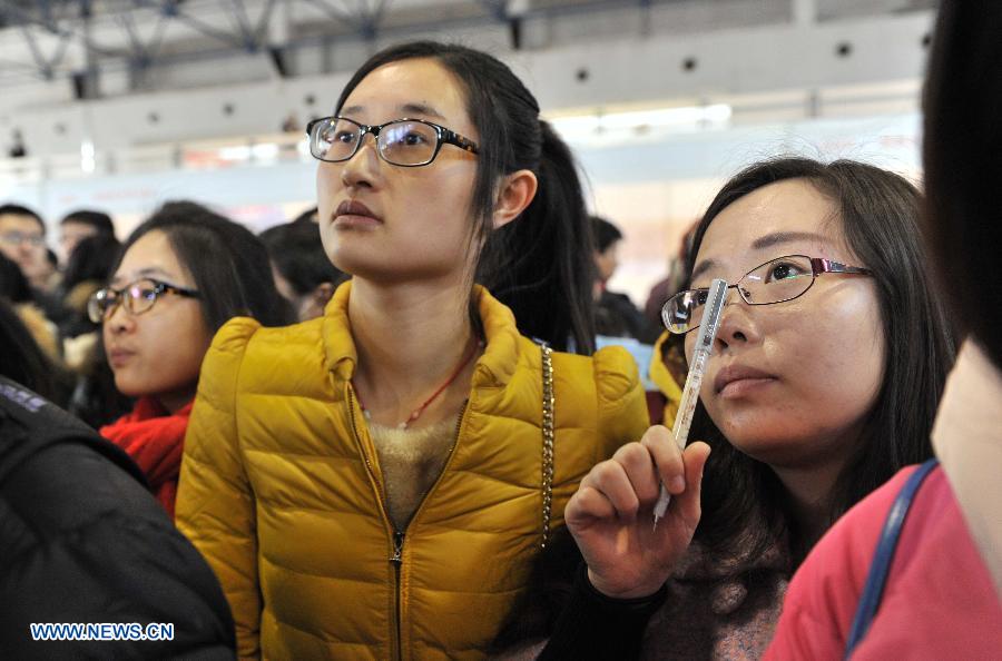 Job seekers attend job fair for postgraduates in Beijing