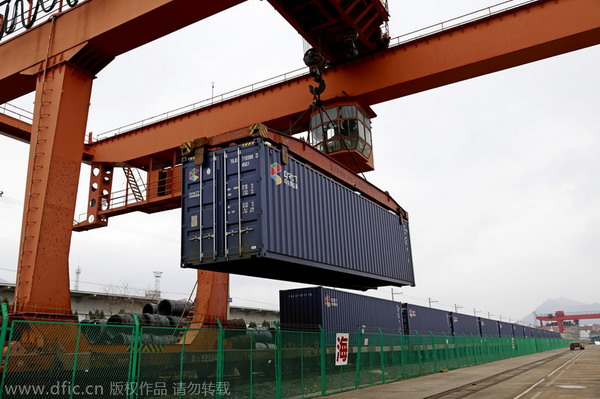 Cargo train arrives in China's small commodity hub from Madrid