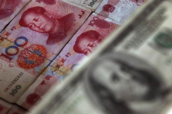 Yuan swings prompt companies to cut dollar debt