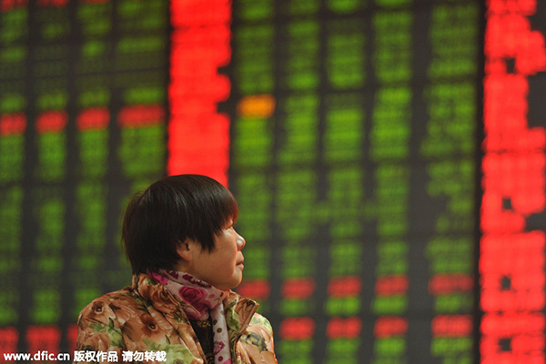 Shanghai index edges below 2,700 mark over profit concerns
