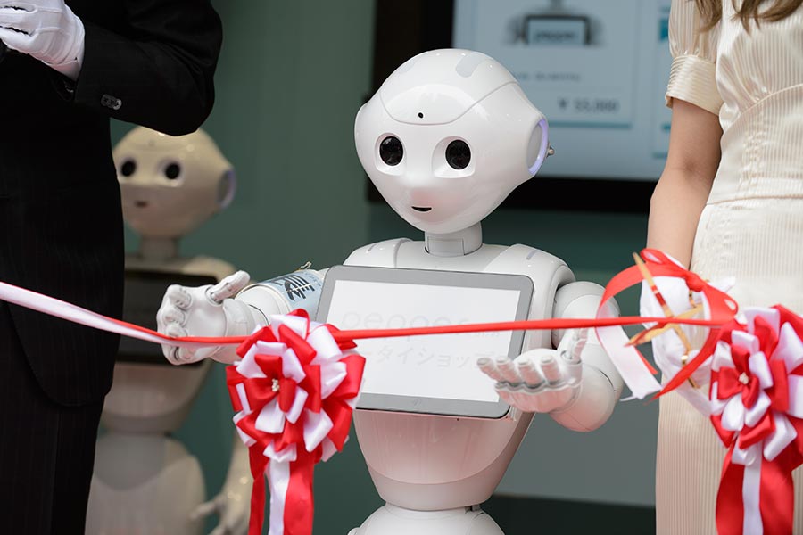 SoftBank staffs cell phone store with Pepper robots