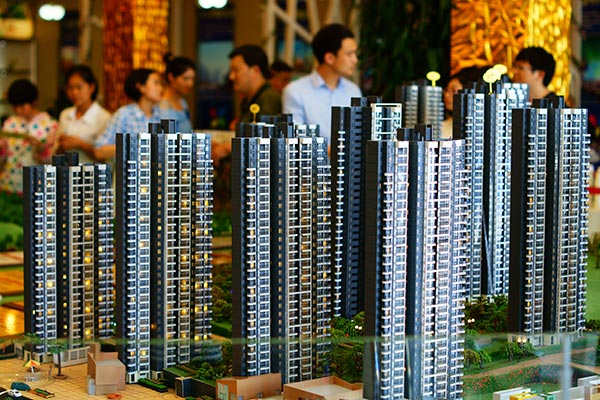 China's home price growth moderates in June