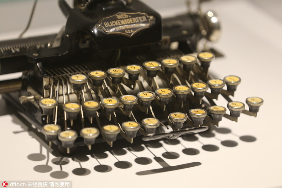 Antique cars, typewriter and telephone on display in Shanghai