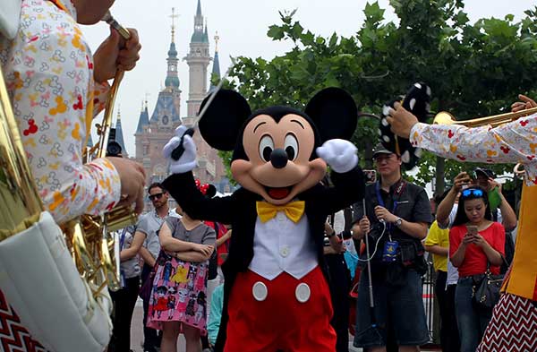 Pre-opening costs at Shanghai Disney drag down earnings