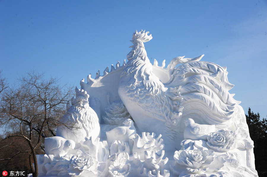 Snow sculptures and ice lanterns heat up Harbin