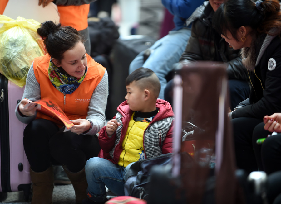 Offering holiday cheer during train station travel rush