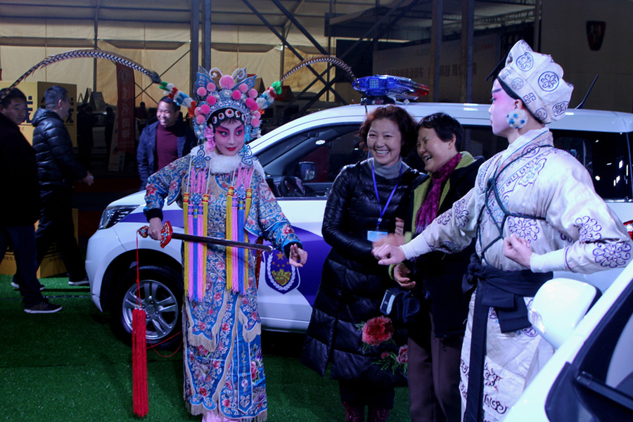 Tradition meets technology: Wu Opera performers take over car show