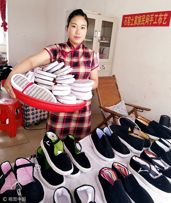 Single mom increases popularity in handmade shoes