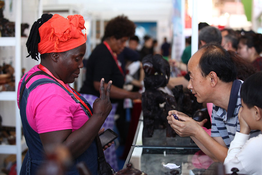 African women sell crystal earning $460 a day