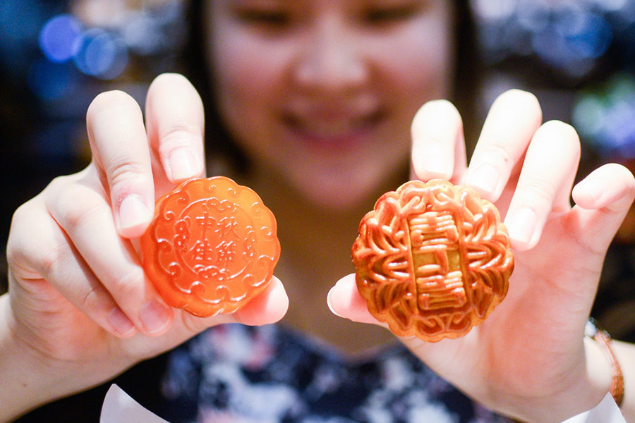 Gold and silver mooncakes look more alluring than real ones