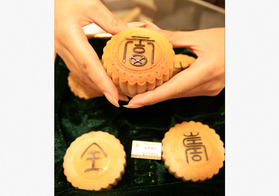 Gold and silver mooncakes look more alluring than real ones