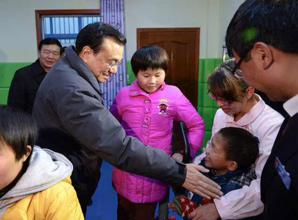 Li reaffirms commitment to social welfare system