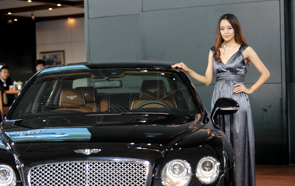 Car models shine at Pan-Asia intl auto show