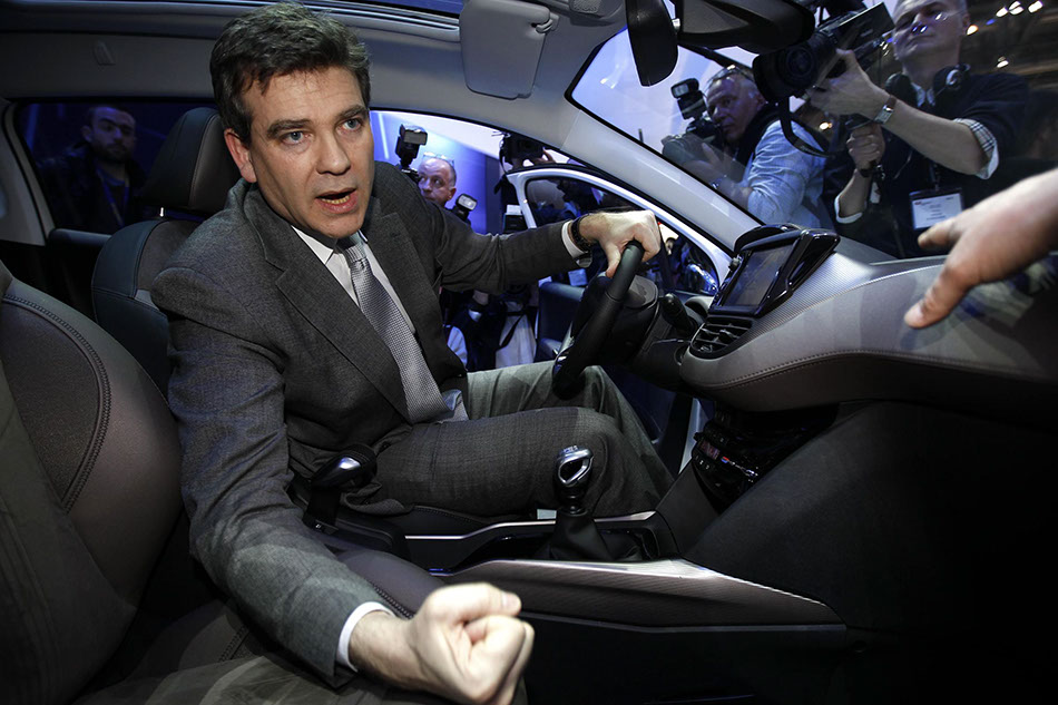 France's Industry Minister inspects Peugeot 2008