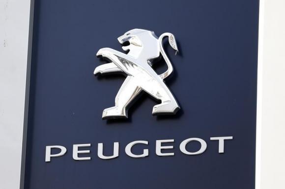 France pledges Peugeot to stay French after fundraising