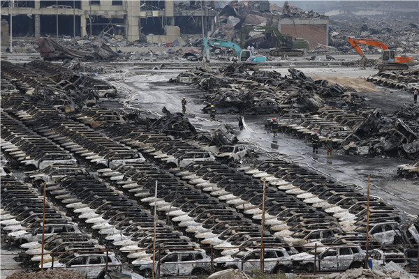 Vehicles damaged in Tianjin blasts sold in auctions