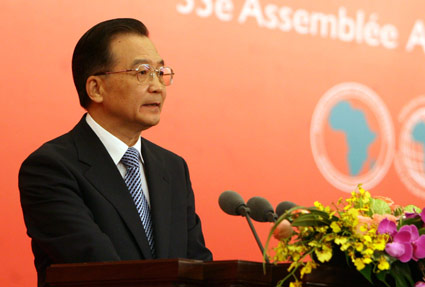 Chinese premier pledges currency reforms