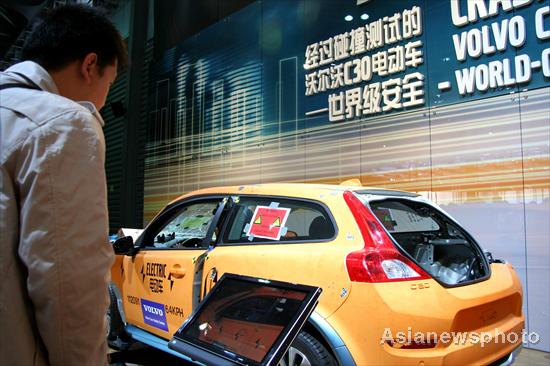 Green cars at the auto show