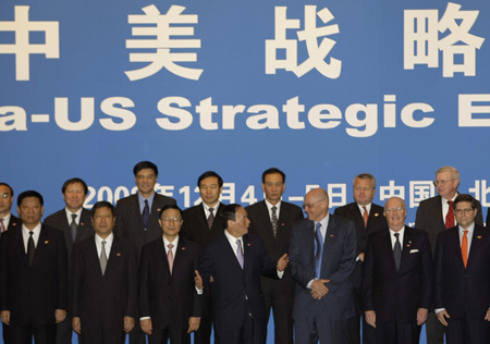 Wang: China, US should work together in financial storm