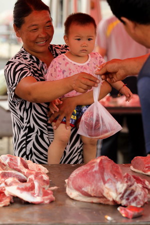 Increasing pork prices breed hopes, worries