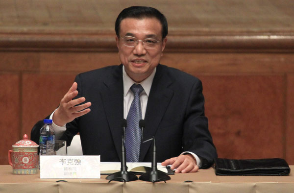 Li meets Hong Kong businesspeople, professionals