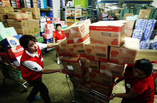 People stock goods for fear of heavy rain