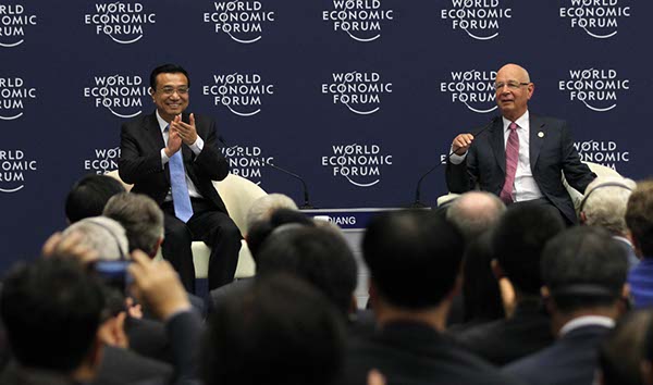 Premier Li meets entrepreneurs, answers questions