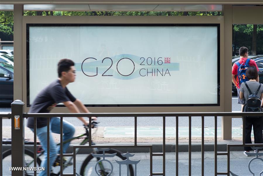 Designers interpret connotation of logo of G20 Hangzhou summit