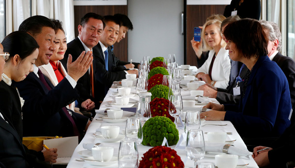President Xi touches down in Switzerland
