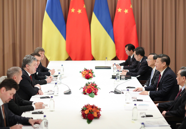 China aims to play constructive role in solving Ukraine crisis