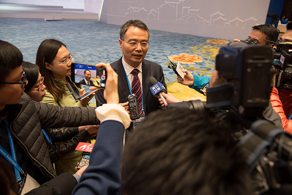 Conference participants warmly respond Xi's congratulatory letter